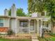 Charming front porch with seating area, enhancing curb appeal and offering a welcoming entrance at 8236 Washington St # 29, Denver, CO 80229