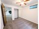 Bright bedroom with large mirrored closet doors and view to finished basement at 420 E 104Th Pl, Northglenn, CO 80233