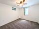 Bedroom with neutral carpet, ceiling fan, and window with blinds at 420 E 104Th Pl, Northglenn, CO 80233