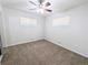 Cozy bedroom featuring a ceiling fan and neutral carpet, perfect for relaxation at 420 E 104Th Pl, Northglenn, CO 80233