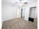 Bright bedroom boasts mirrored closet doors and soft carpeting, creating a welcoming space at 420 E 104Th Pl, Northglenn, CO 80233