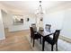 Cozy dining area with hardwood floors, leading to the kitchen and entryway at 420 E 104Th Pl, Northglenn, CO 80233