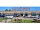 Exterior view of Edgewater Public Market, featuring various local eateries and shops, with ample parking at 3200 Ames St, Wheat Ridge, CO 80212