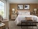 Relaxing bedroom with a comfortable bed, neutral decor, and ample natural light, ideal for rest and rejuvenation at 24005 E Utah Pl, Aurora, CO 80018