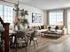 Bright living room featuring modern decor, a comfortable sofa, and large windows offering natural light at 24005 E Utah Pl, Aurora, CO 80018