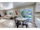 The dining area seamlessly connects to the living room, fostering an open and inviting atmosphere at 8696 E Easter Ave, Centennial, CO 80112