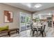 Bright dining area with sliding glass doors offers easy access to the backyard and patio at 8696 E Easter Ave, Centennial, CO 80112