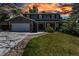 Beautiful two-story home featuring a well-manicured lawn and inviting curb appeal at 8696 E Easter Ave, Centennial, CO 80112