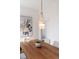 Close-up view of an elegant chandelier and dining set at 1741 N Emerson St, Denver, CO 80218