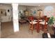 Finished basement featuring a seating area, a table and a desert landscape mural at 21024 E 49Th Ave, Denver, CO 80249