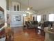 Bright and airy living room with hardwood floors and high ceilings at 21024 E 49Th Ave, Denver, CO 80249