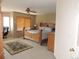 Spacious main bedroom suite with plush carpet, wooden furniture, and a ceiling fan at 21024 E 49Th Ave, Denver, CO 80249