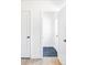 Bright entryway features stylish black and white patterned tile flooring for a modern touch at 4023 E Martin Luther King Jr, Denver, CO 80207