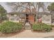 Inviting two-story condo building featuring well-maintained landscaping and a charming walkway entrance at 14602 E 2Nd Ave # 110C, Aurora, CO 80011