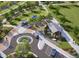 Community aerial view with park, parking, covered picnic area and food trucks at 6570 Parterre N Pkwy # 1, Thornton, CO 80602