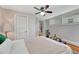 Comfortable bedroom with ample natural light, hardwood floors, and neutral colors at 132 W Bayaud Ave, Denver, CO 80223