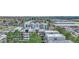An aerial shot capturing a residential complex with vibrant trees and a mix of commercial and residential surroundings at 364 S Ironton St # 425, Aurora, CO 80012