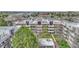 Stunning aerial view highlighting manicured landscaping, red brick accents, and convenient location near mature trees at 364 S Ironton St # 425, Aurora, CO 80012