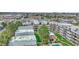 A captivating aerial view of an apartment complex boasting mature trees and inviting green spaces at 364 S Ironton St # 425, Aurora, CO 80012