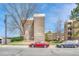 Exterior view of a well-kept apartment complex with street parking and manicured landscaping at 364 S Ironton St # 425, Aurora, CO 80012