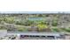 Scenic neighborhood view showcasing nearby park, pond, lush trees, and a convenient location at 364 S Ironton St # 425, Aurora, CO 80012