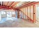 Unfinished basement with high ceilings and egress window at 1225 Briarhollow Way, Highlands Ranch, CO 80129