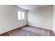 Bright bedroom featuring neutral walls and carpet at 1225 Briarhollow Way, Highlands Ranch, CO 80129