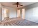 Primary bedroom with multiple closets and carpet flooring at 1225 Briarhollow Way, Highlands Ranch, CO 80129