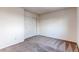 Well-lit bedroom with double door closet at 1225 Briarhollow Way, Highlands Ranch, CO 80129