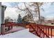 Deck with wooden railings and view at 1225 Briarhollow Way, Highlands Ranch, CO 80129