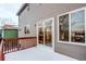 Wooden deck with sliding glass doors at 1225 Briarhollow Way, Highlands Ranch, CO 80129