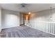 Loft area with access to upstairs hallway at 1225 Briarhollow Way, Highlands Ranch, CO 80129