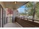 Private balcony overlooking trees and other buildings at 23619 Genesee Village Rd # B, Golden, CO 80401