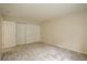 Spacious bedroom with ample closet space and neutral carpeting at 23619 Genesee Village Rd # B, Golden, CO 80401