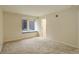 Bright bedroom with neutral carpeting and window seat at 23619 Genesee Village Rd # B, Golden, CO 80401