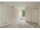 Bright bedroom with window, closet, and neutral wall colors at 23619 Genesee Village Rd # B, Golden, CO 80401