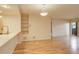 Dining area with hardwood floors and access to patio at 23619 Genesee Village Rd # B, Golden, CO 80401