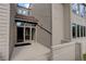 Inviting exterior entrance with a covered entryway and steps leading to the front door at 23619 Genesee Village Rd # B, Golden, CO 80401