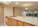 Kitchen with light countertops and wood cabinets at 23619 Genesee Village Rd # B, Golden, CO 80401