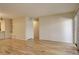 Living room with hardwood floors and access to other rooms at 23619 Genesee Village Rd # B, Golden, CO 80401