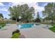 Community swimming pool with lounge chairs at 23619 Genesee Village Rd # B, Golden, CO 80401