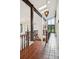 Bright foyer with tile flooring, skylight, and wood accents offering an open and inviting entrance at 11621 Shoshone Way, Denver, CO 80234