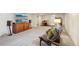 Finished basement with TV, entertainment center, drum set and sitting area at 6188 S Westview St, Littleton, CO 80120