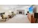 Finished basement with a cozy fireplace and entertainment area at 6188 S Westview St, Littleton, CO 80120