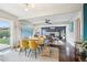 Bright dining area seamlessly connects to the living room, creating an open and airy living space at 6188 S Westview St, Littleton, CO 80120