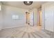 Bright bedroom with ceiling fan, a white board, and two closets at 3130 Hardin St, Castle Rock, CO 80109