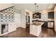 Stylish kitchen with stainless steel appliances, island, and modern lighting at 3130 Hardin St, Castle Rock, CO 80109