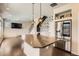 Bright, open kitchen features a large island, pendant lighting, and stainless steel appliances at 3130 Hardin St, Castle Rock, CO 80109