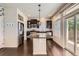 Modern kitchen featuring stainless steel appliances, center island, and stylish finishes at 3130 Hardin St, Castle Rock, CO 80109