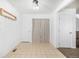 Bright dining area with access to kitchen and coat hooks on the wall at 2728 Renshaw St, Strasburg, CO 80136